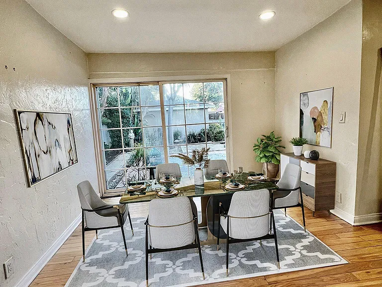 Dining area, virtually staged, gorgeous view of back garden