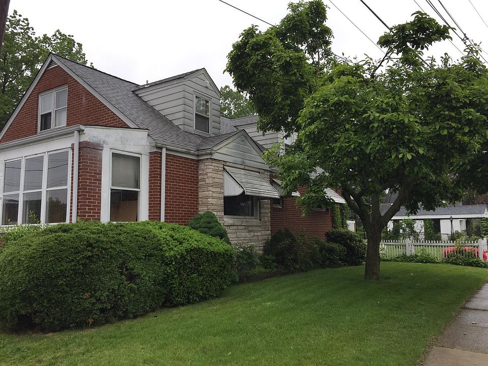 Corner view of house and side yard.