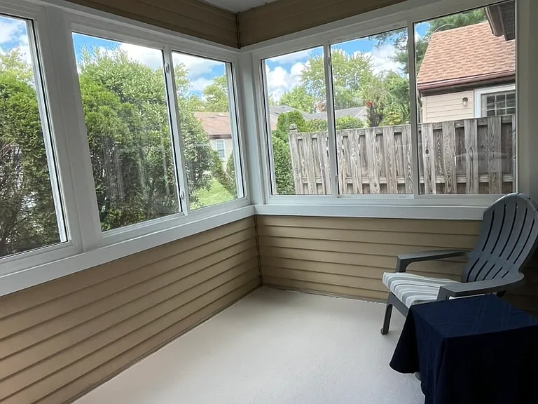 Bright Four-Season Sunroom

The enclosed four-season sunroom is one of the home's standout features_perfect for morning coffee, reading, puzzles, or simply relaxing while enjoying peaceful garden views in every season.