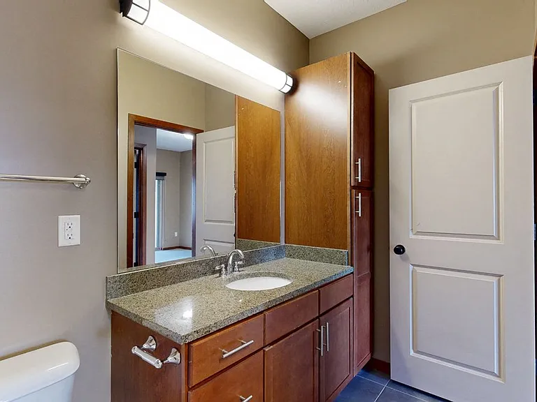 Bathrooms feature sleek finishes and ample storage to make your daily routine comfortable and efficient.