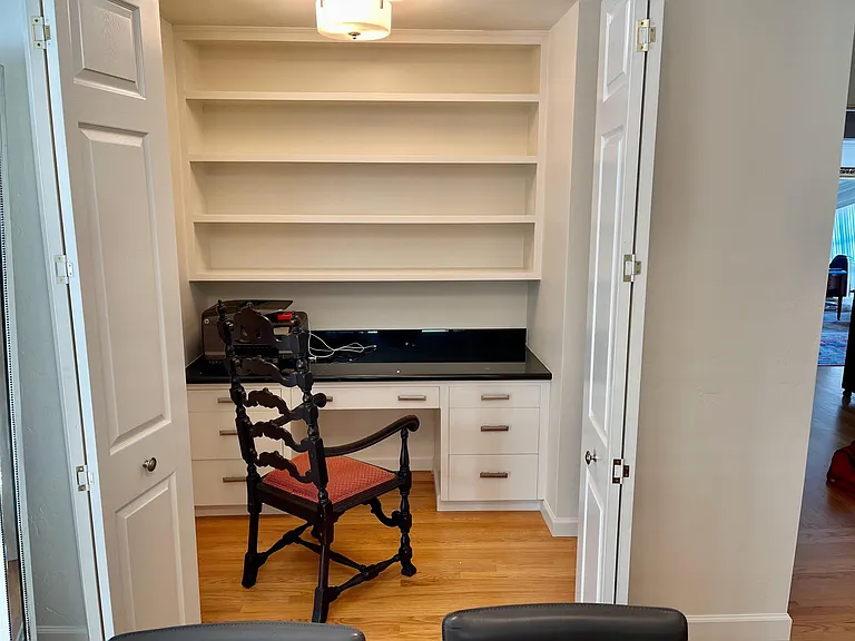 Mini Den / Private Work Area with built-in desk and Shelving and privacy doors