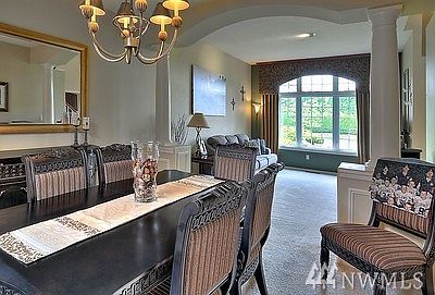 Formal dining looking into living room.