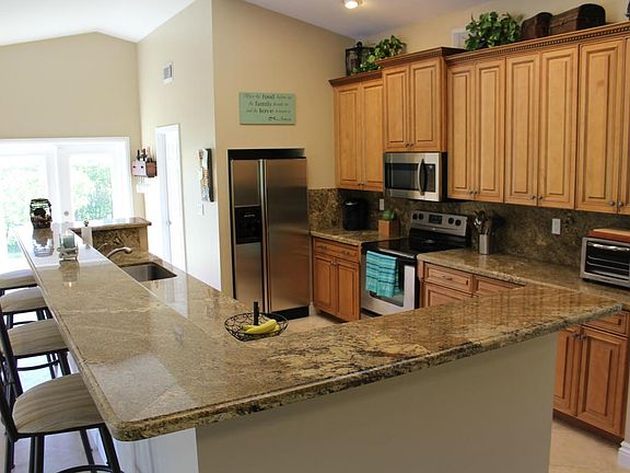 Kitchen with view towards utility door