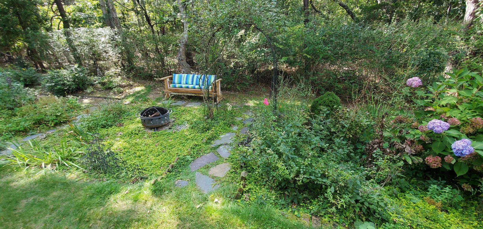  Garden Bench & Fir Pit in the Side Perennial Garden