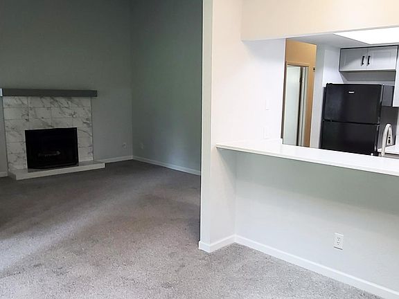 From dining room looking into living room and kitchen.