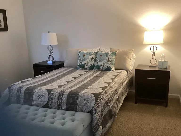 Full size bed in guest bedroom