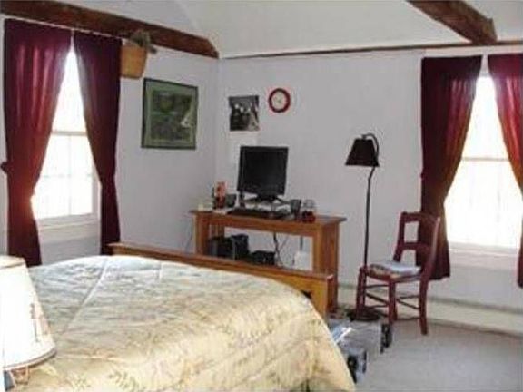 One of three bedrooms