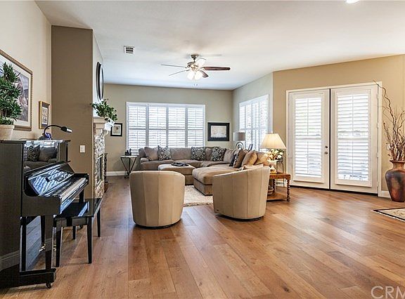 Living Room is so Spacious with "Walls of Windows" that provide so much Natural Light.