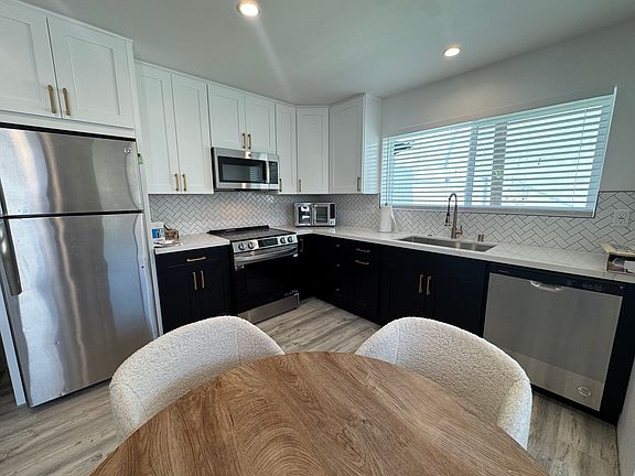 Fully equipped kitchen , pots , pans, utensils, cups , air fryer