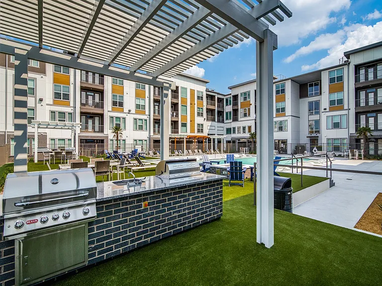 Grill and chill at out poolside pergola