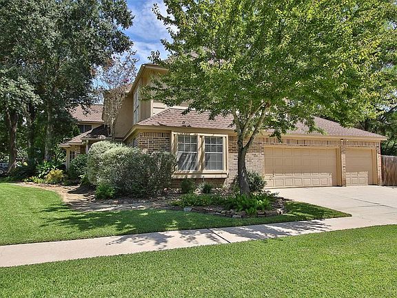 Nice trees and landscaping all round. Easy access true 3-car garage.