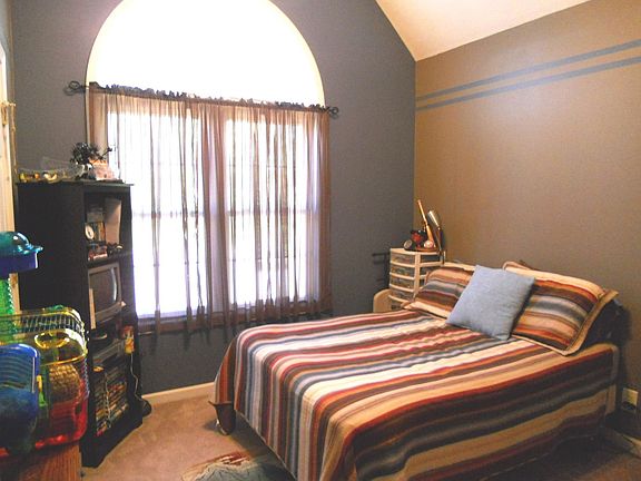 Bedroom 3 with vaulted ceilings