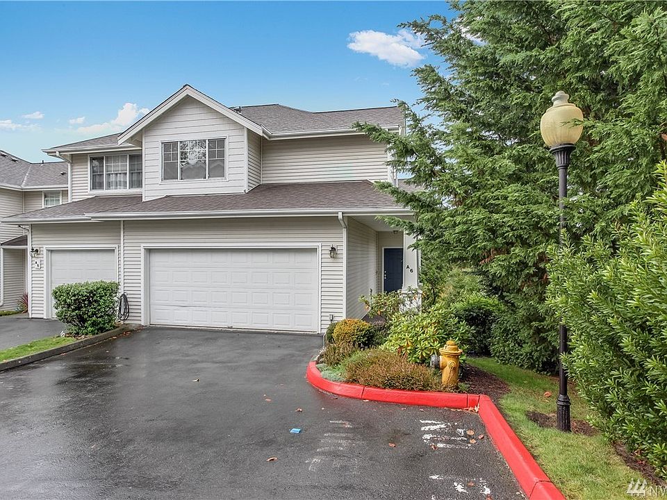 Welcome home to Westgate Condominiums! Delight in this RARE 4 bedroom / 4 bath end unit with privacy galore! Enter to soaring ceilings and a wall of windows. This condo feels like a house with 3 levels of spacious living areas. The main floor spaces flow from large dining room to family room and kitchen with open sight lines and high ceilings. Enjoy west facing valley and sunset views from the kitchen and deck. Upstairs you will find two guest rooms and a large master suite with exquisite sunset views, walk-in closet and ensuite master bath with soaking tub. The lower level boasts a huge family room, 4th guest room and 3/4 bath with a slider to the lawn. Spacious 2 car garage with room for 2 additional cars to park in front. 