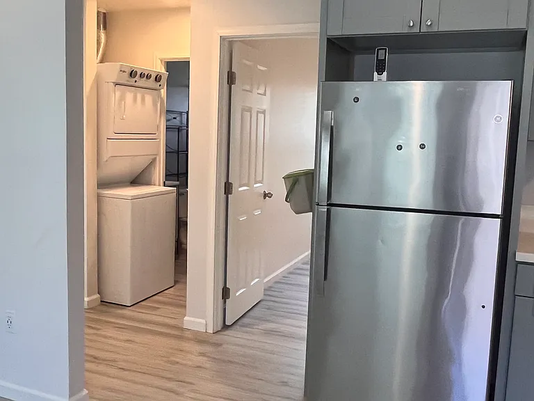 Washer & dryer next to the bathroom