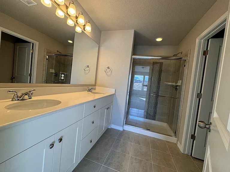 High end master bathroom with walk in shower.