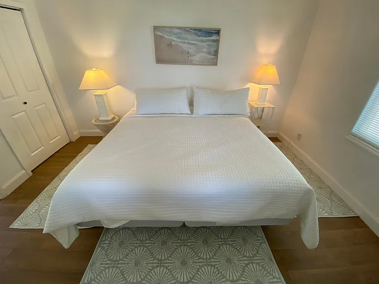 One of the 3 bedrooms upstairs with a king bed