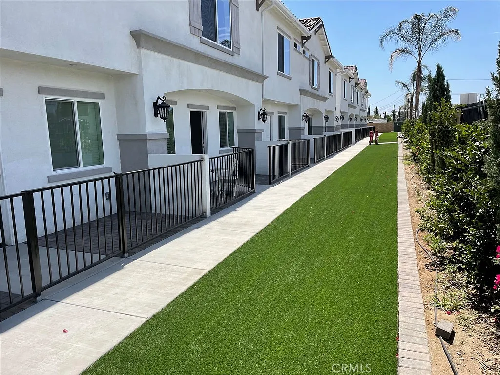 Building Photo - 13665 Arrow Blvd #6