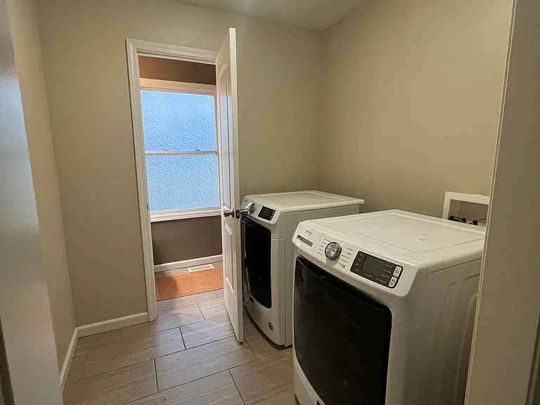 Laundry room with washer and dryer.