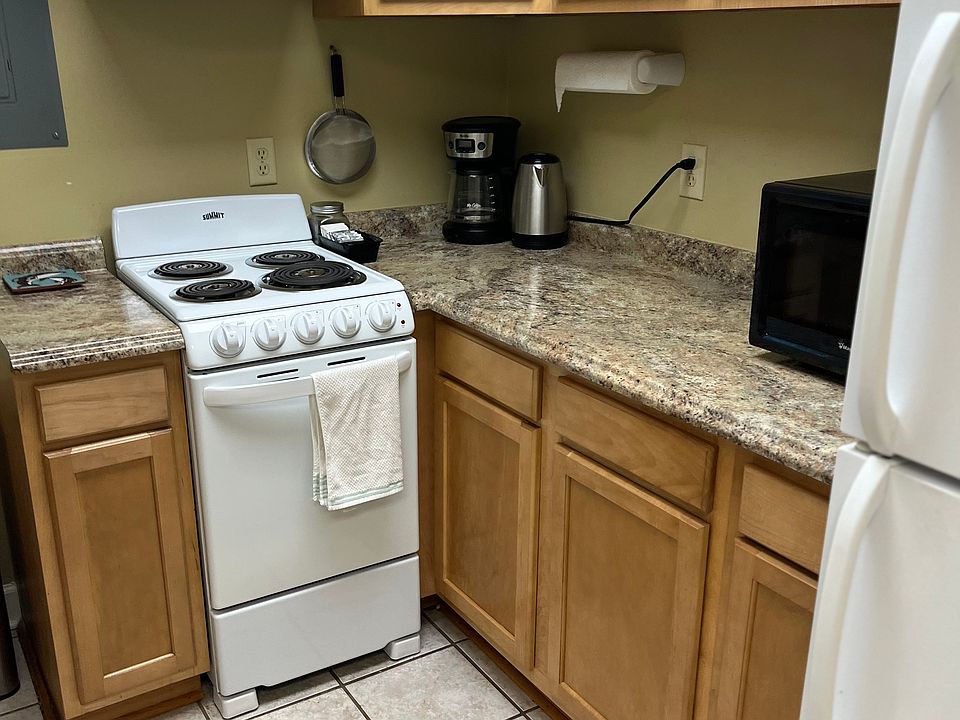 Kitchen, stove, microwave, fridge, crock pot and fully equipped kitchen with cookware, baking dishes, utensils, dishes, coffee pot, tea kettle, everything you need