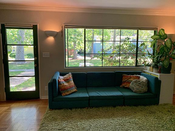 Living room plunked down in the middle of a forest.