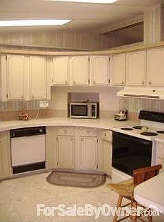 love the cabinet space : clean, modern kitchen, easy to maintain all appliances stay -great fridge!