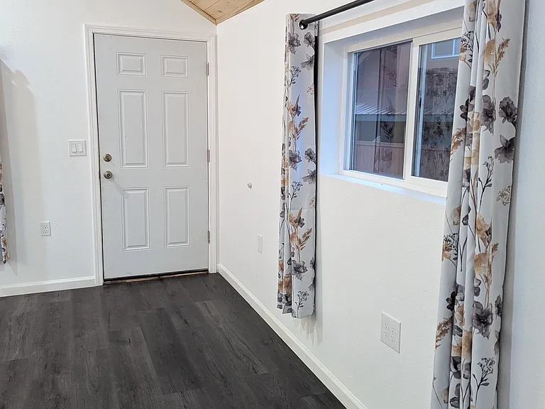 Master has high pine ceilings.
