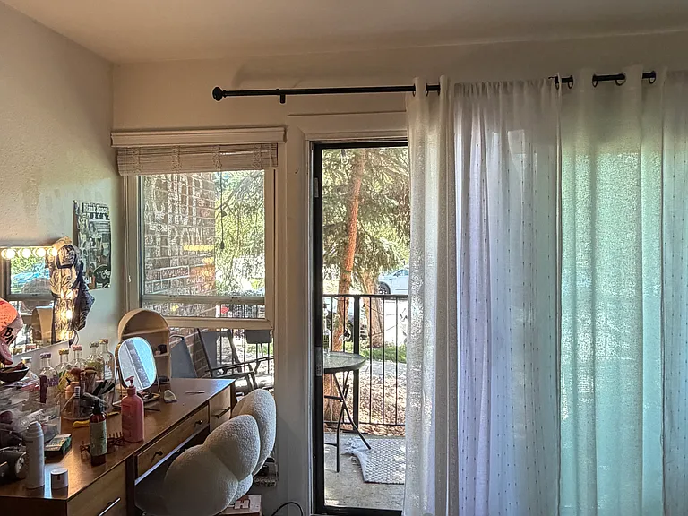 Upstairs bedroom with balcony