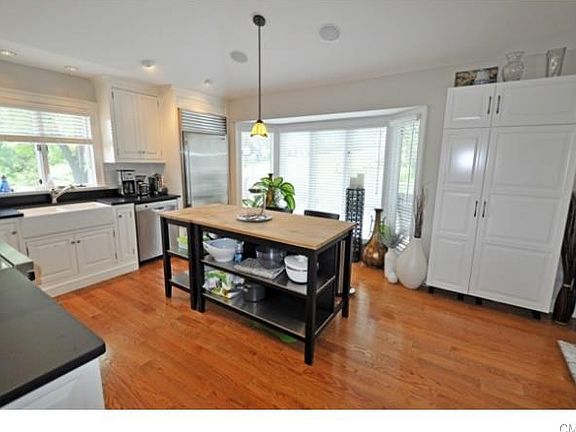 Spacious Kitchen with SS appliances and HW Floor