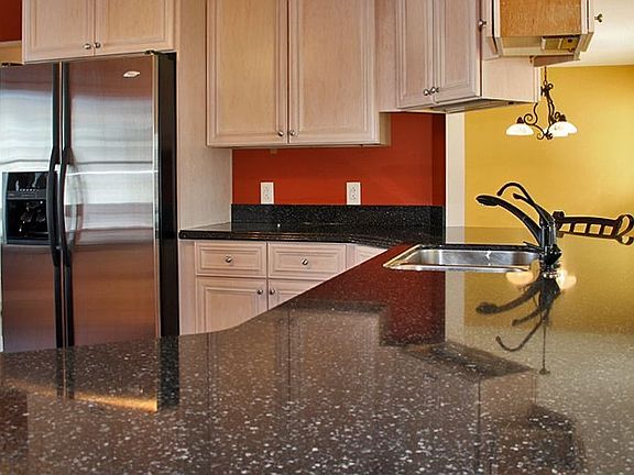 Cambria countertops and custom Omega cabinets!