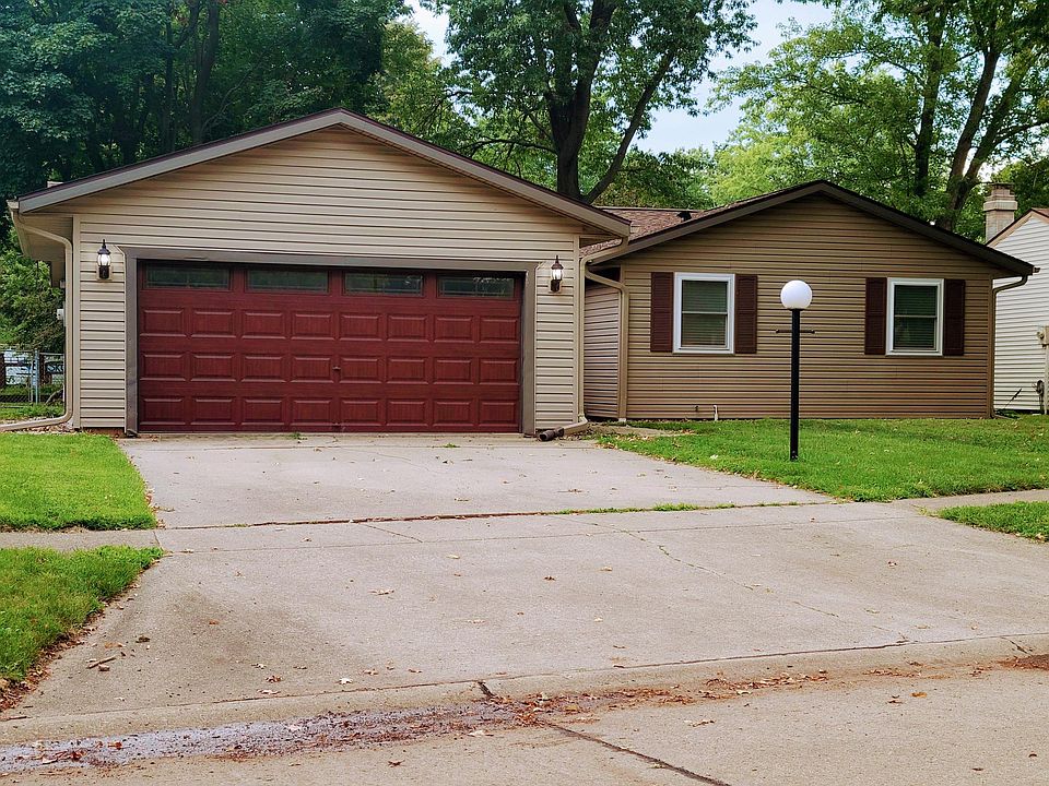 Large driveway for convenient off-street parking in addition to large 2 car garage.