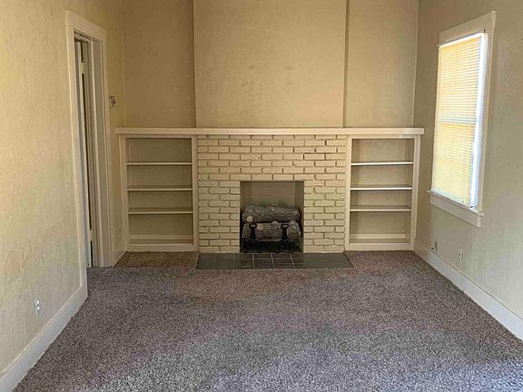 Living area with faux logs-not operable