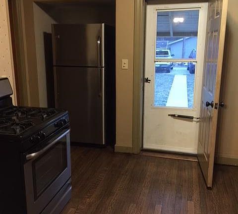 Kitchen with view of off-street parking