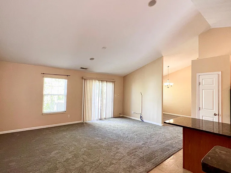 Cathedral ceilings in the family room with an open floor plan.