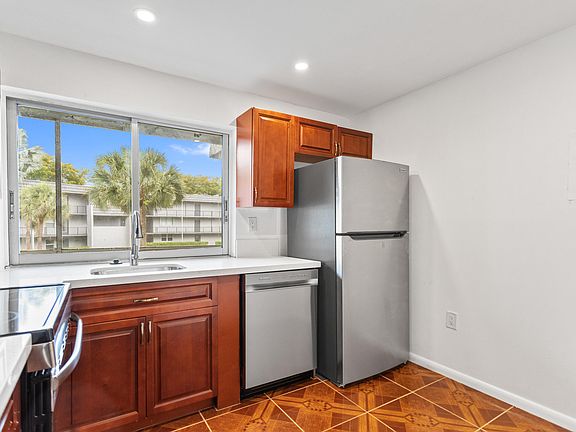 2nd image of 9091 Lime Bay Boulevard #210