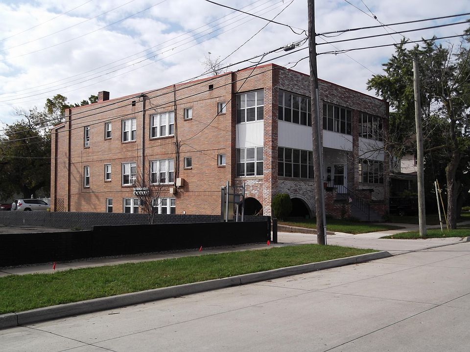 View of the outside of the building, unit available is the upper left.