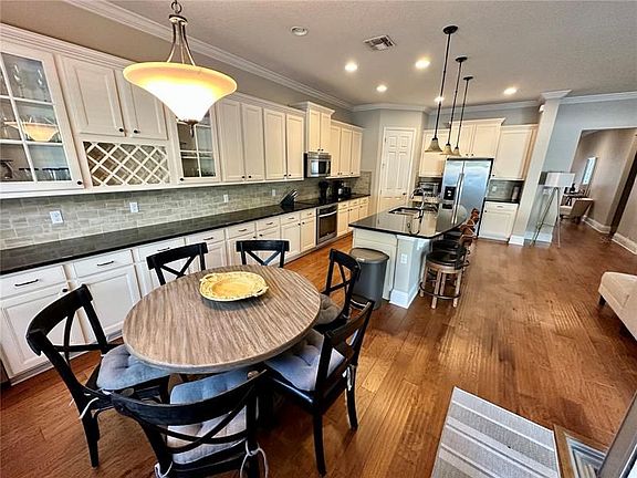 4th image of 9569 Royal Estates Blvd