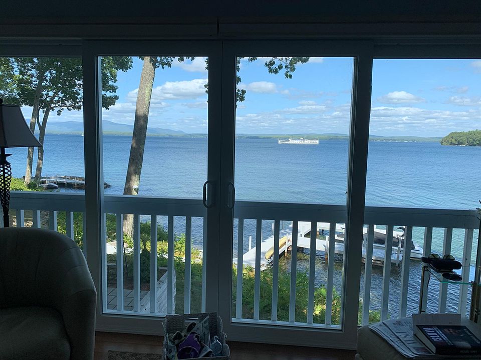 Living room looking out onto Lake Winnipausakee