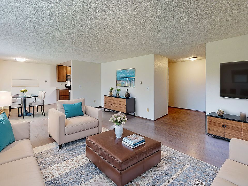 Experience comfort and elegance in this stylish open-plan living and dining space.