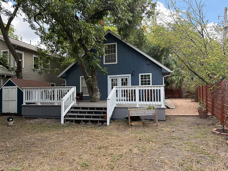 Large back yard, deck, side yard, and shed