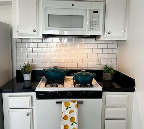 Kitchen includes refrigerator