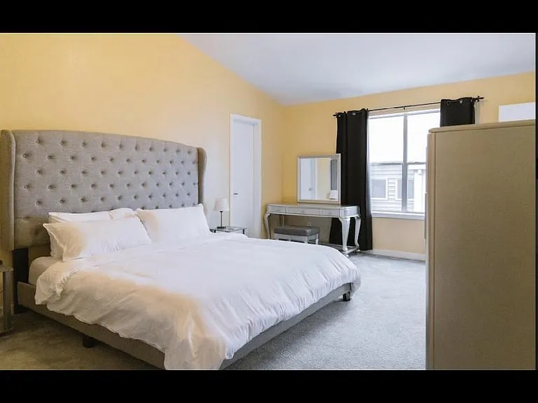 bedroom 1 with walk-in closet