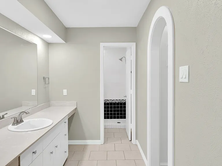 Primary bathroom and walk in closet.