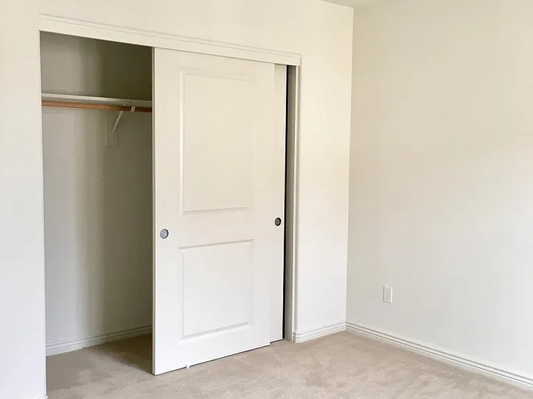 Bedroom 2 has plenty of natural lighting and has large closet storage.