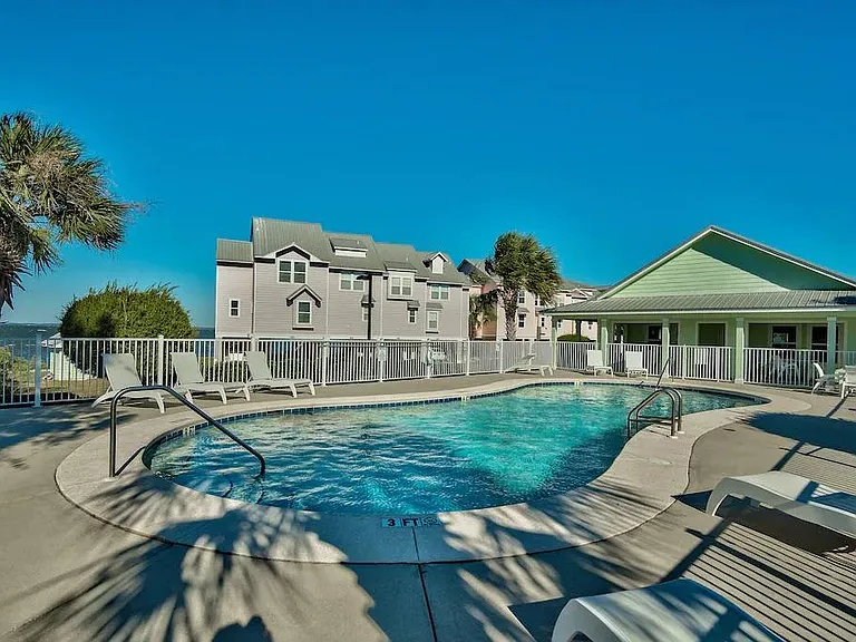 The heated pool offers resort-style lounging with easy access to the clubhouse.