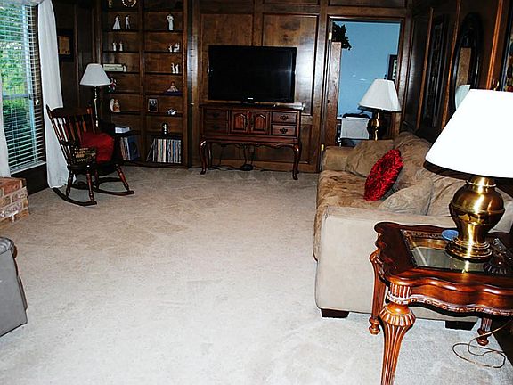 At the back of the house, you are greeted by the warm family room. Move in and start creating wonder