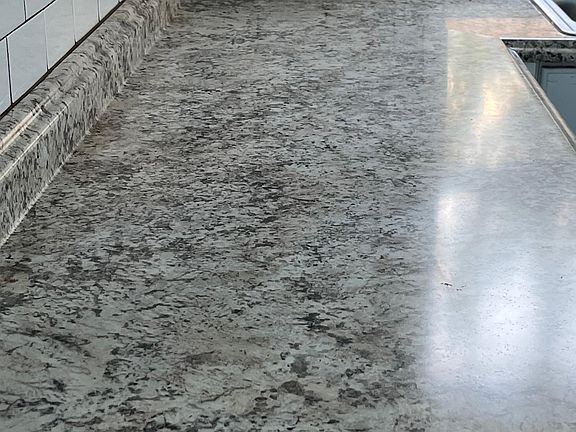 Brand new countertops, plenty of counter space. No grout lines so easy clean up.