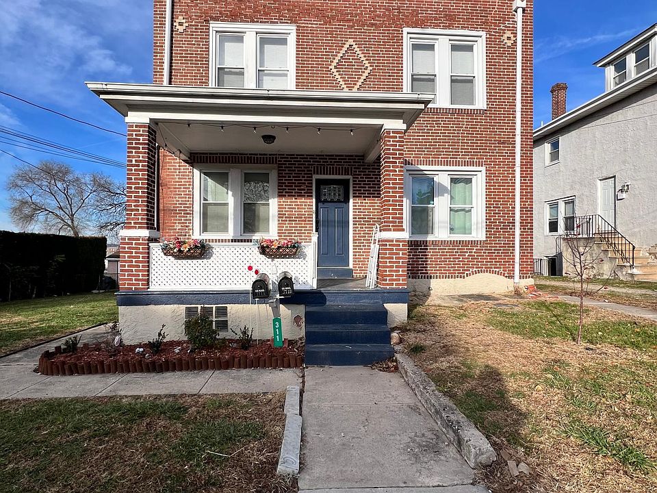 Front of property. Unit A access if right through blue door. Tenant has access to porch in front.
