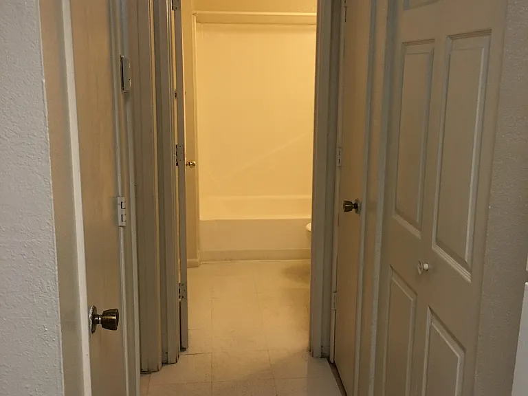 Hallway from kitchen to bathroom