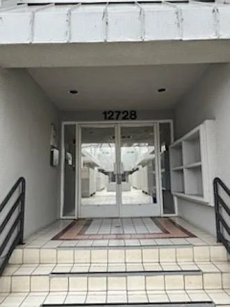 Code-accessed locked front door