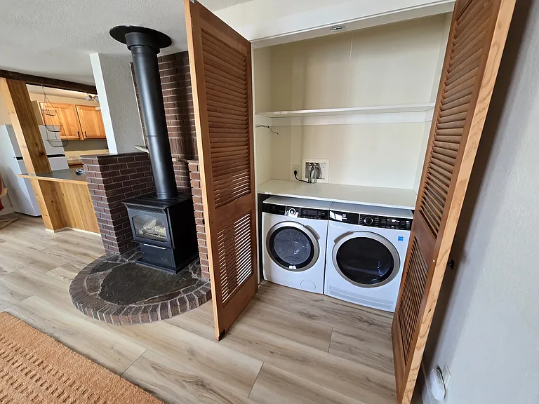 Washer/dryer closet with folding table....